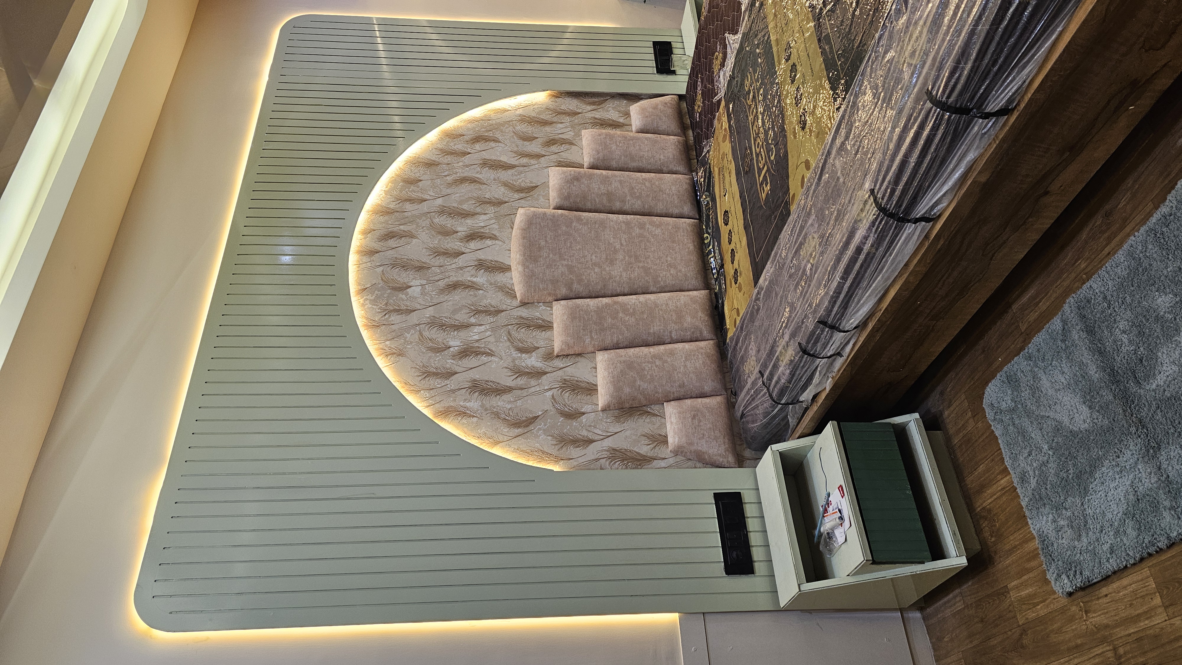Custom fluted wooden wall panelling and brass detailing